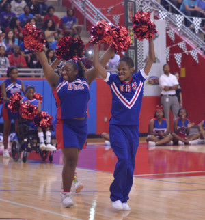 Sparkler Cheerleaders pump up the crowd at a pep rally. They received a standing ovation at every event they cheered at this year. (Tomica Charles photo)